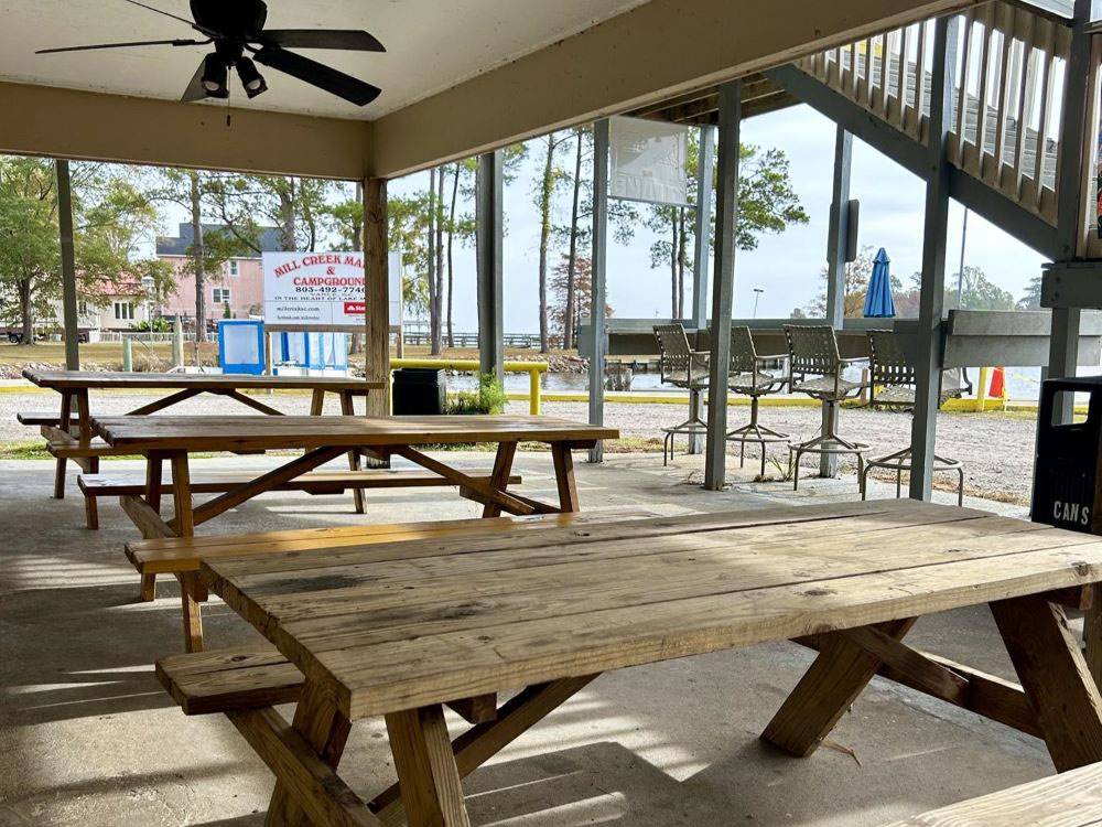 An outdoor covered eating area at Mill Creek Marina & Campground