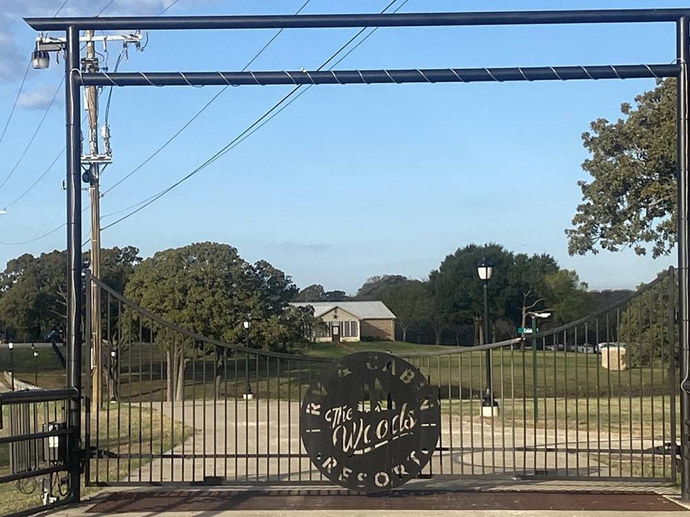 The security gate at the entrance of the park at The Woods RV and Cabin Resort