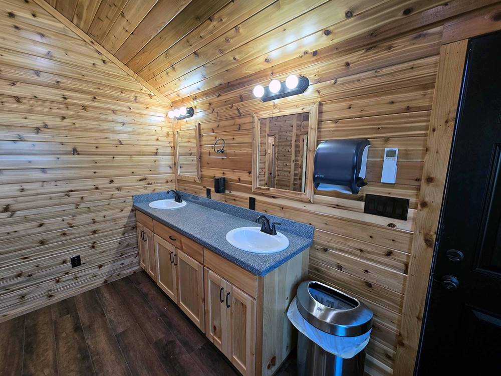 Knotty pine restroom sinks at Pitmaster RV Park