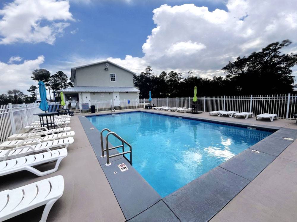 Swimming pool with lounge chairs