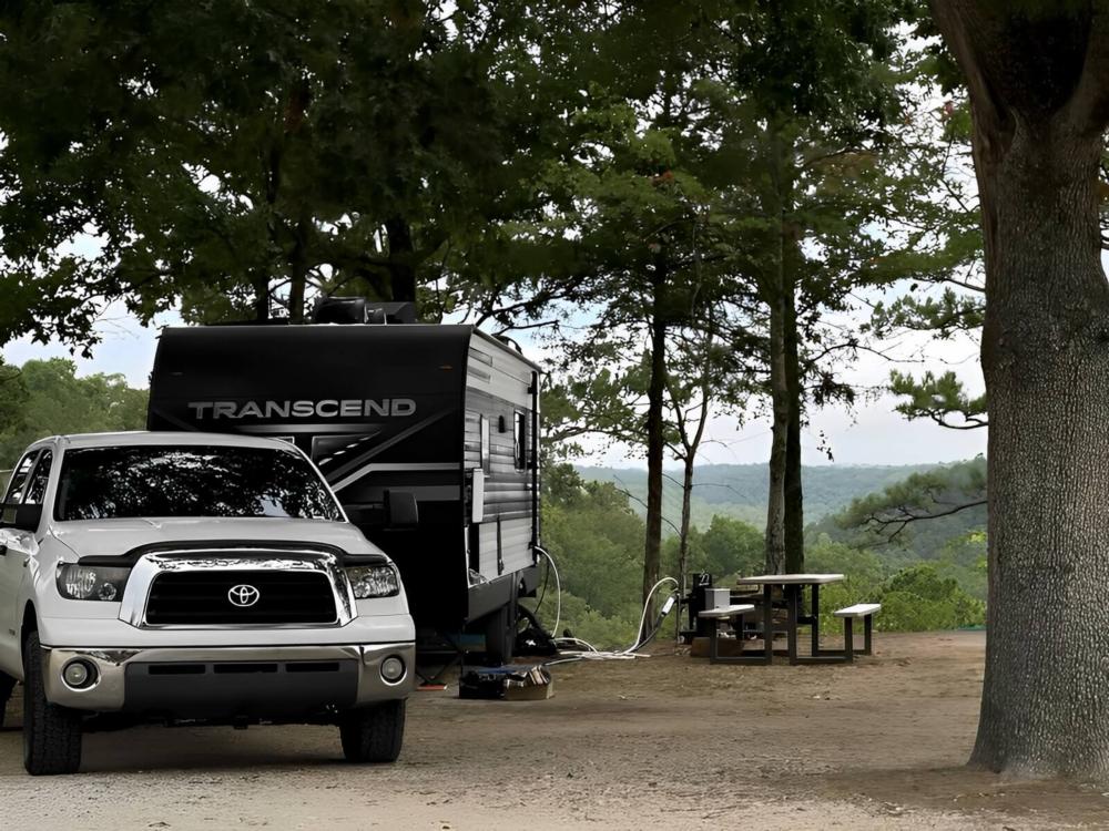 Parked trailer at site Route 62 Motor Resort