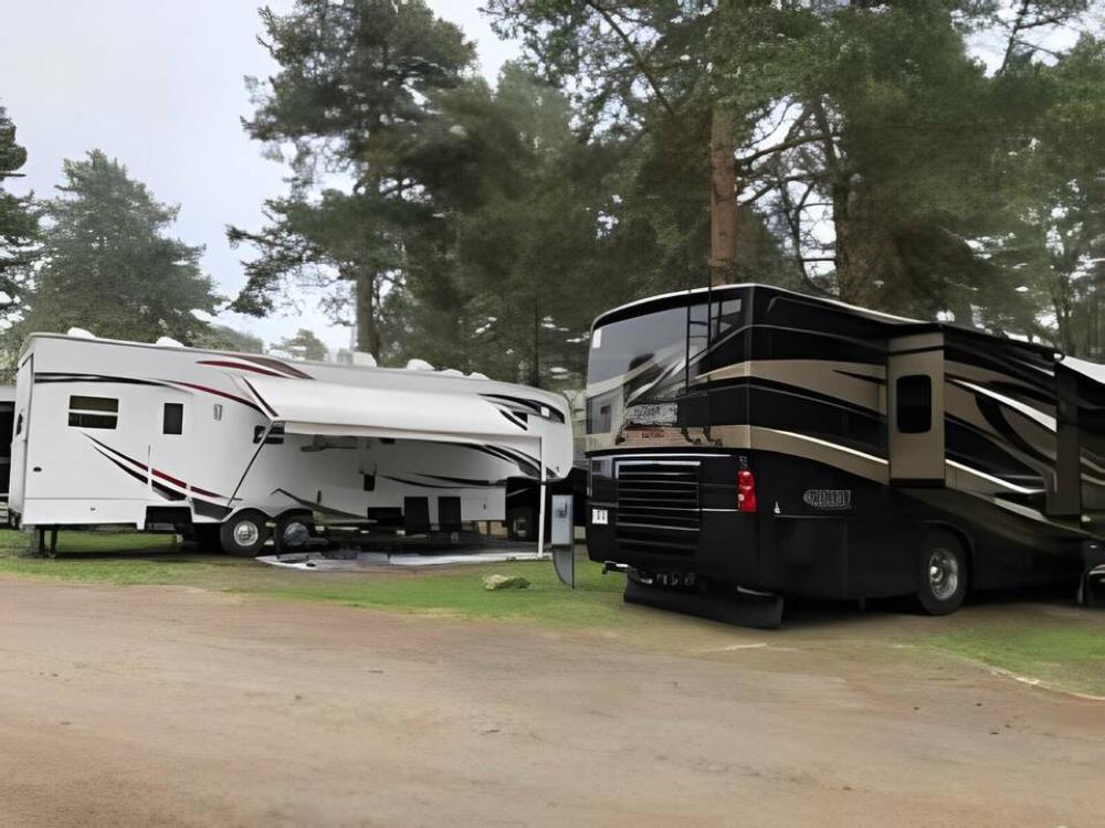 View of a rv site at High Pines RV Park