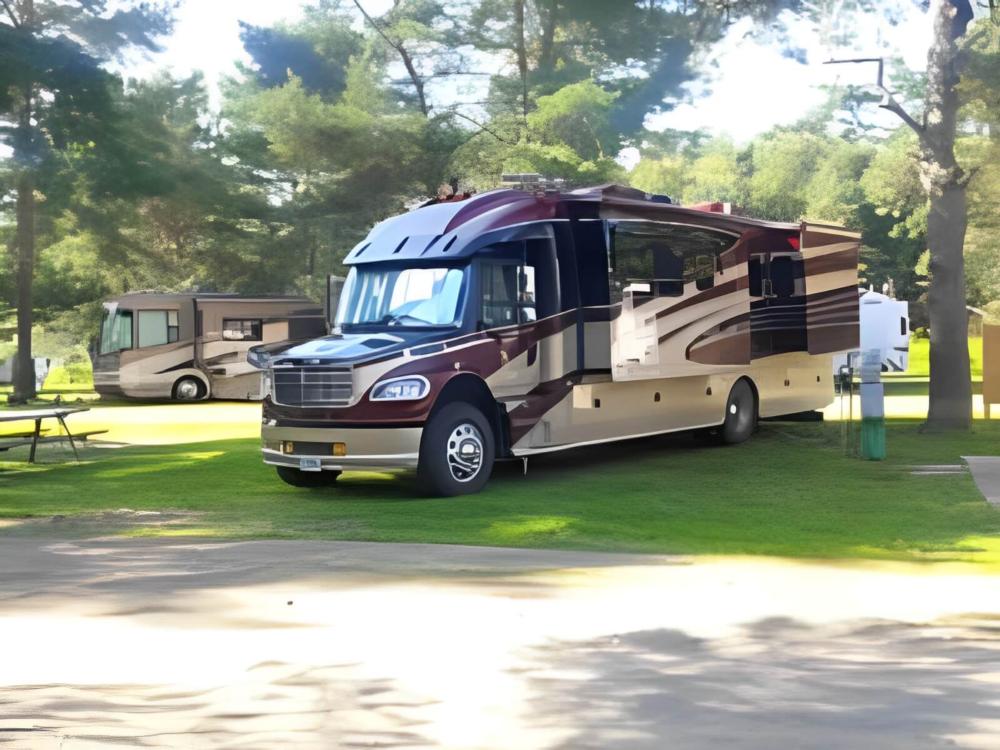 Parked RV at site High Pines RV Park