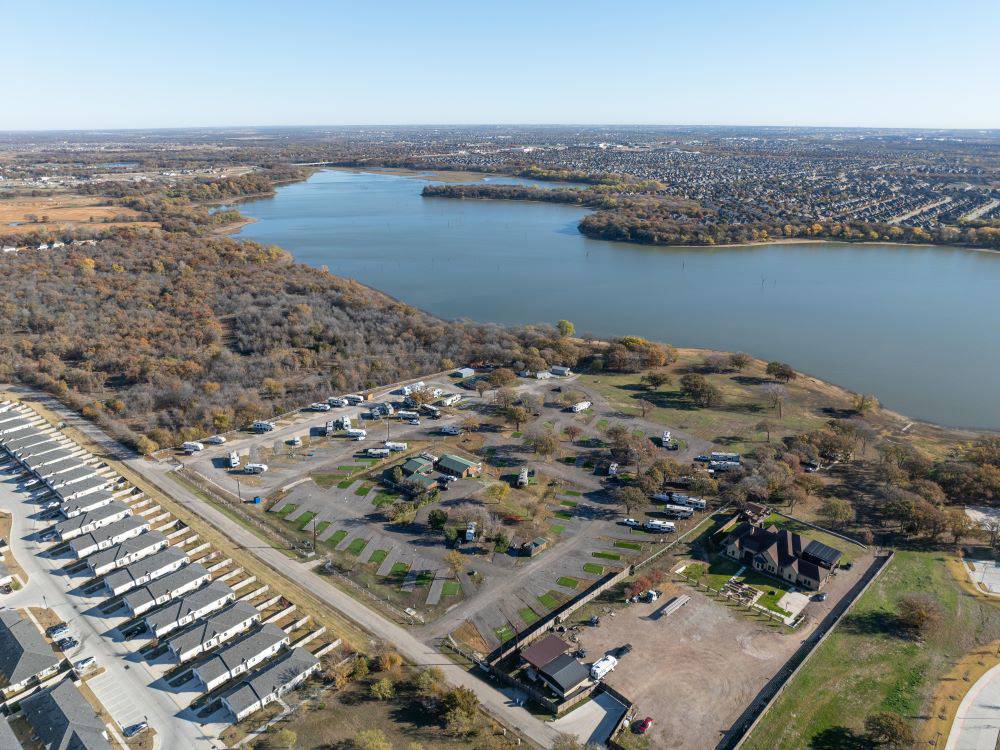 Aerial view of the park and river at Waterfront Hideaway Ranch