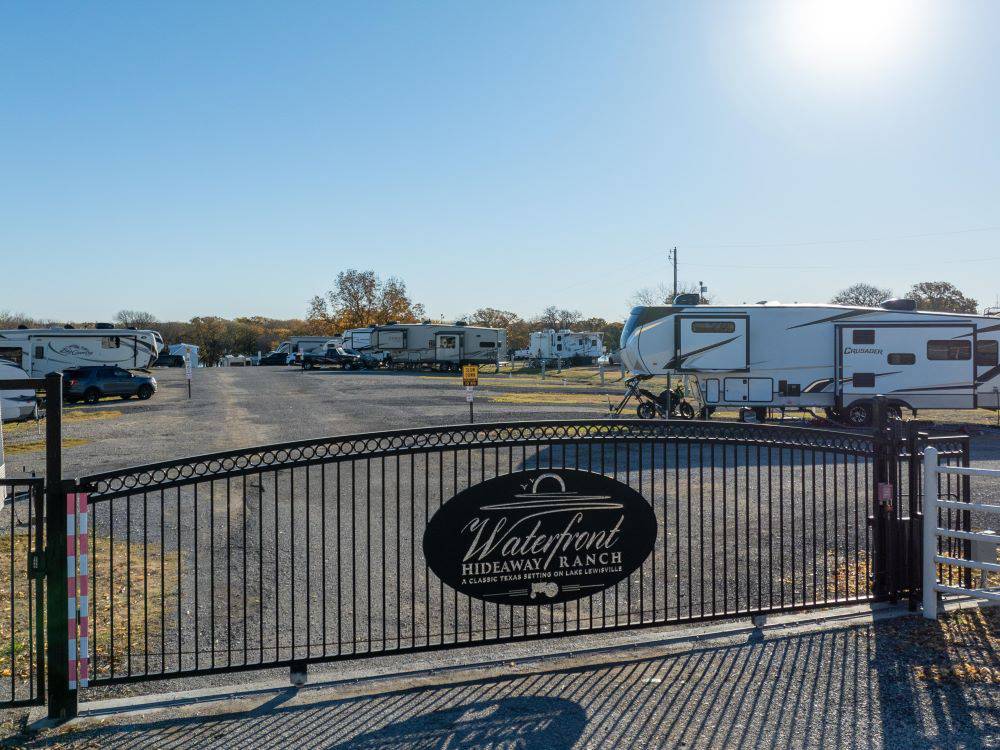 The secure gate at the entrance of the park at Waterfront Hideaway Ranch