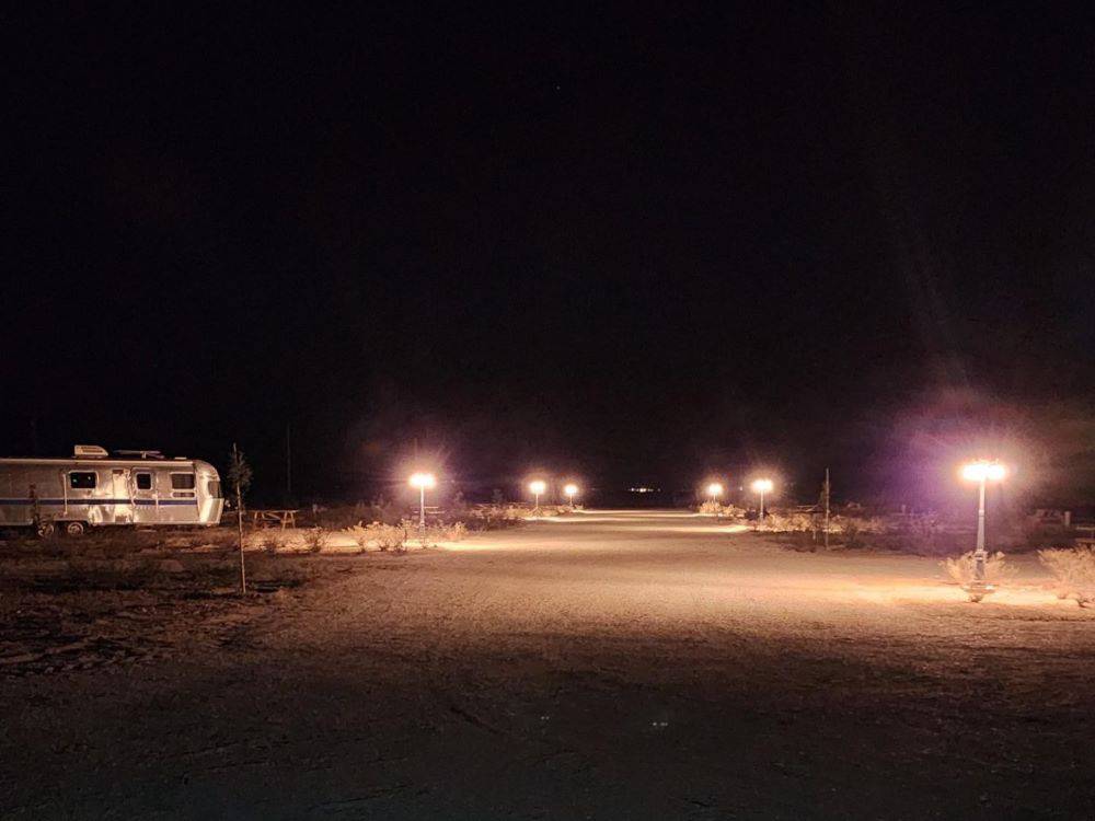 The gravel interior road and RV sites at night at Mountain View RV Park