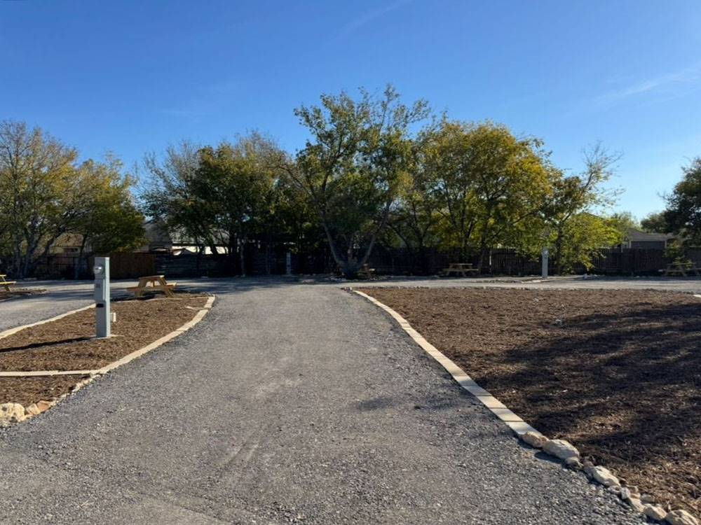 A long pull-thru gravel RV site