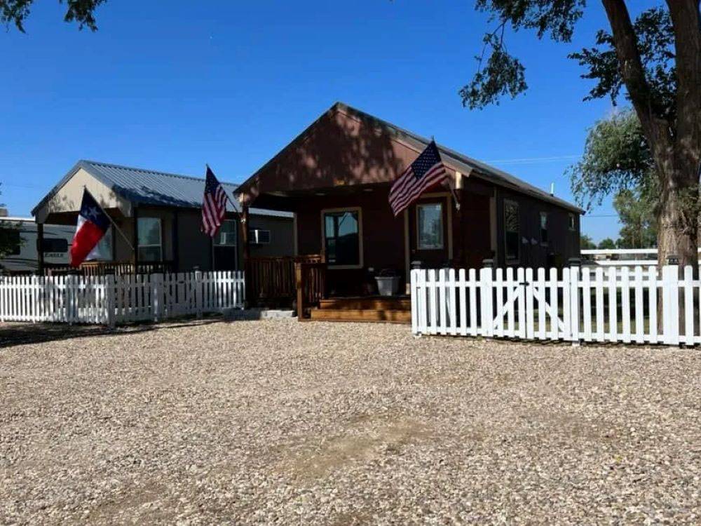 Rental units with white picket fences