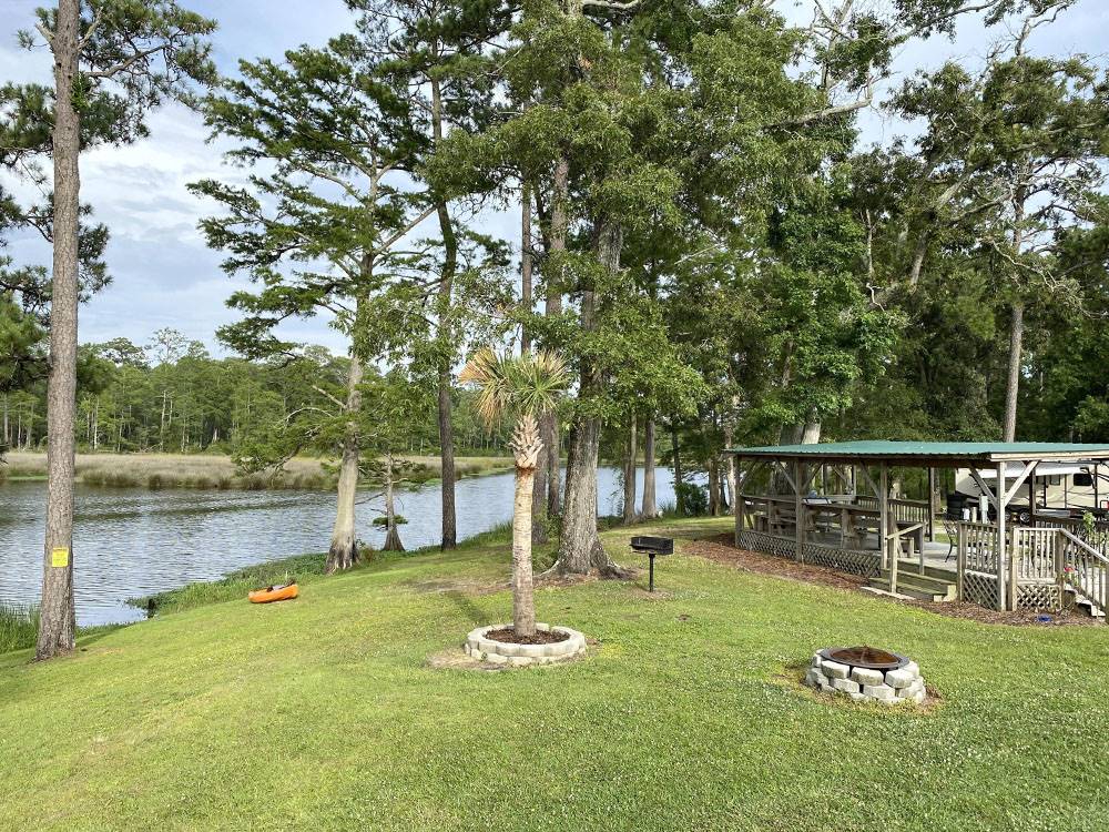 A covered sitting area near the water