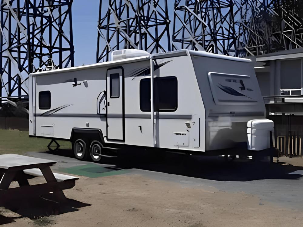 Trailer parked in a site by the bridge