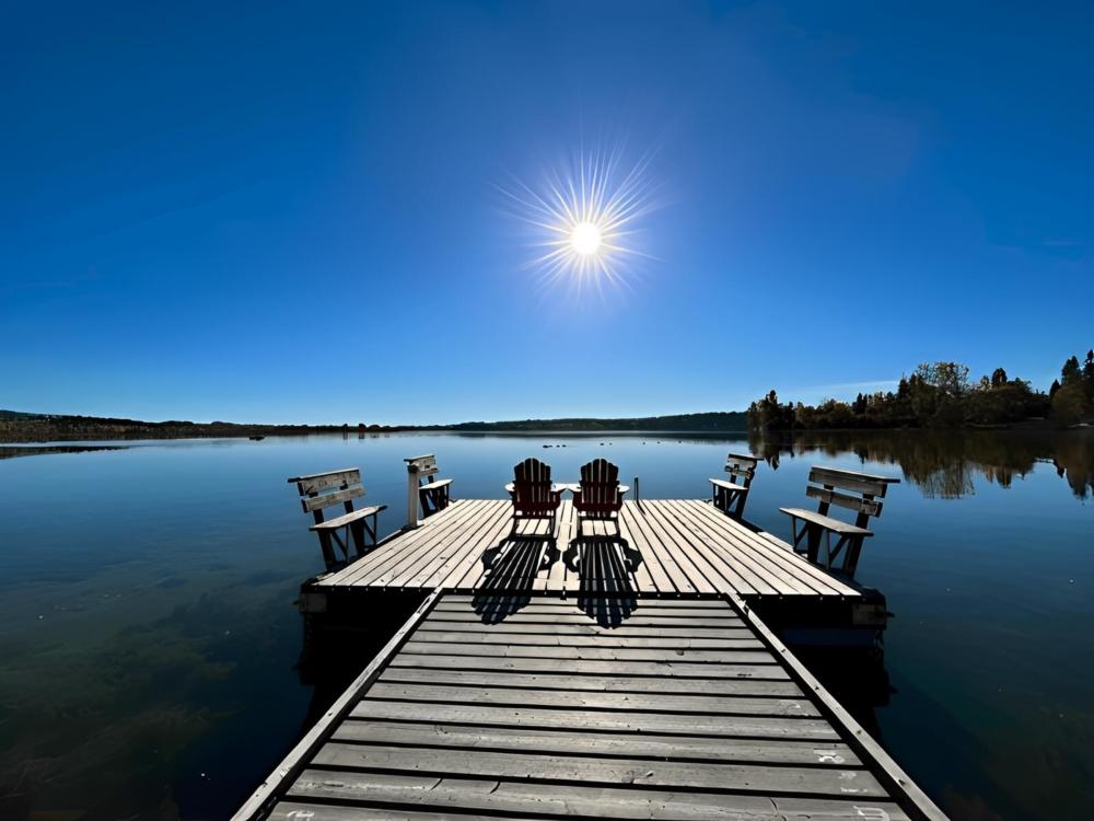 Seating area on a dock at site Robert's Roost Resort