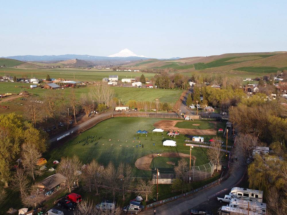 Aerial view of campground with mountain in the background
