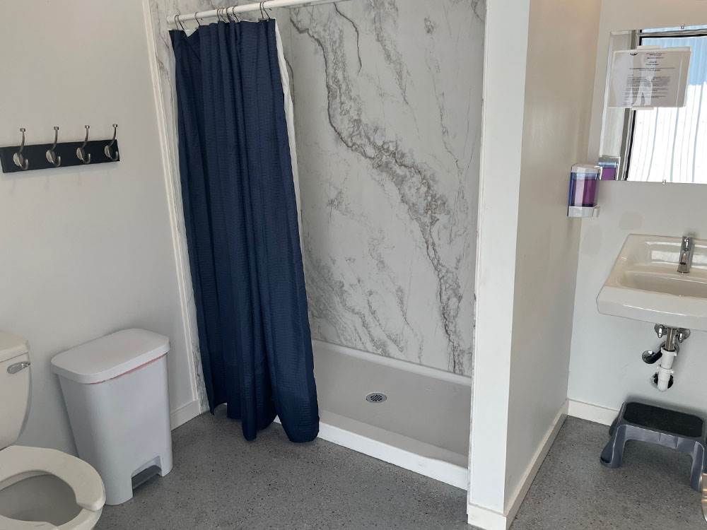 Bathroom with hooks for clothes