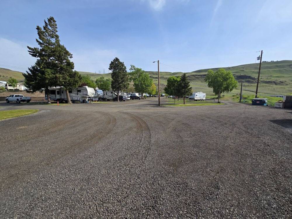 A gravel road leading to RV sites