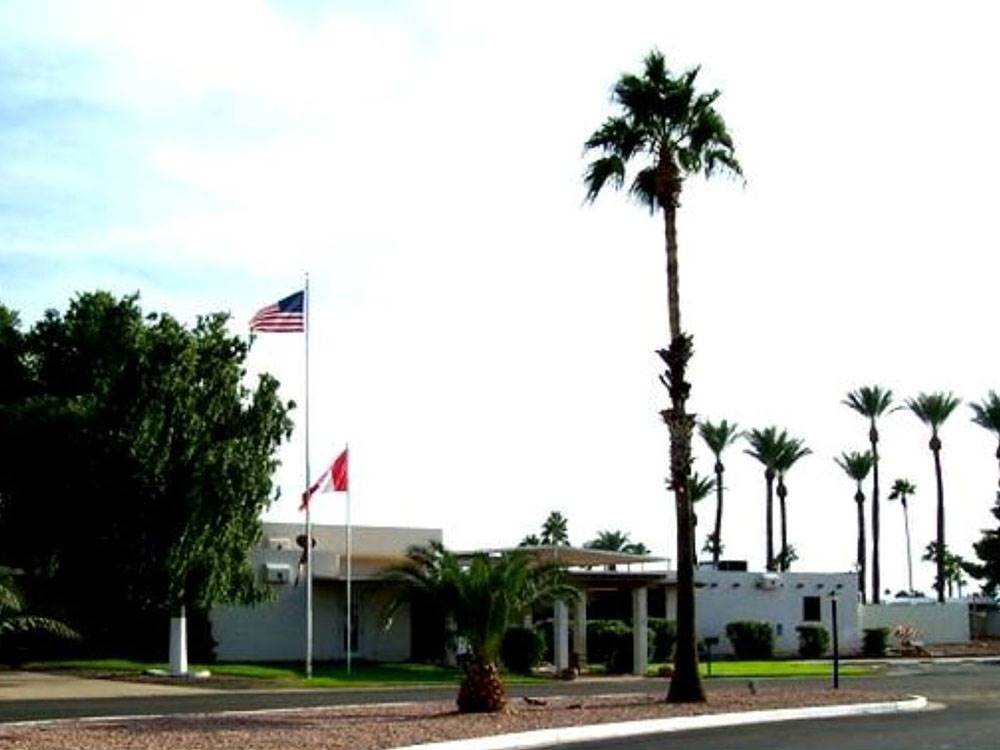 A building with flags flying in front