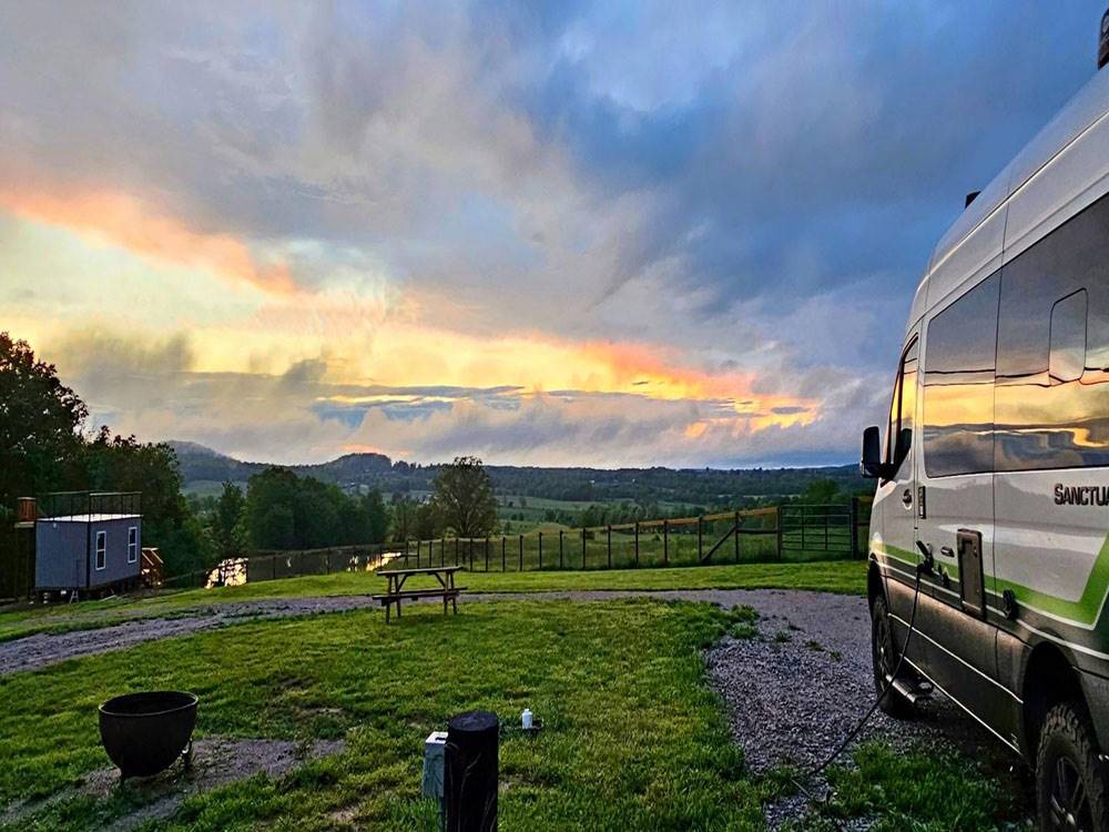 An RV site at sunset