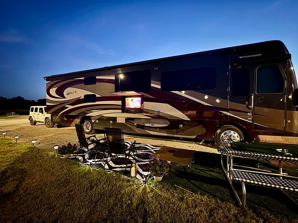 A large class A motorhome at sunset