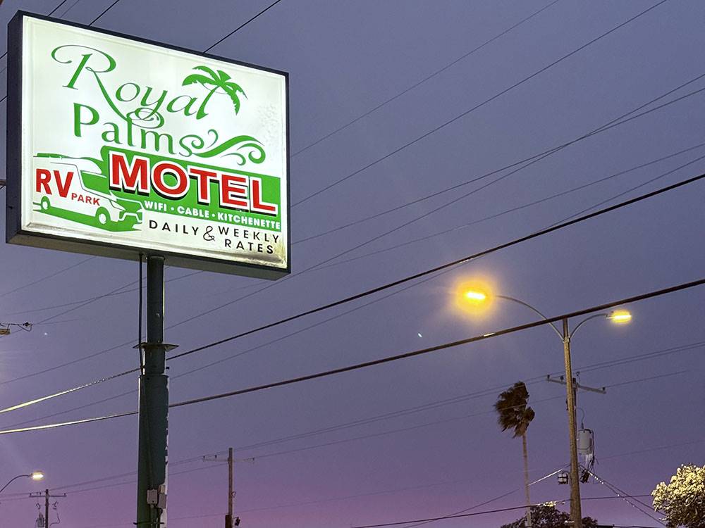 The park sign at dusk
