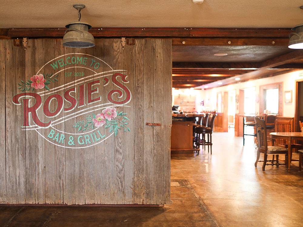 A sign for Rosie's Bar & Grill