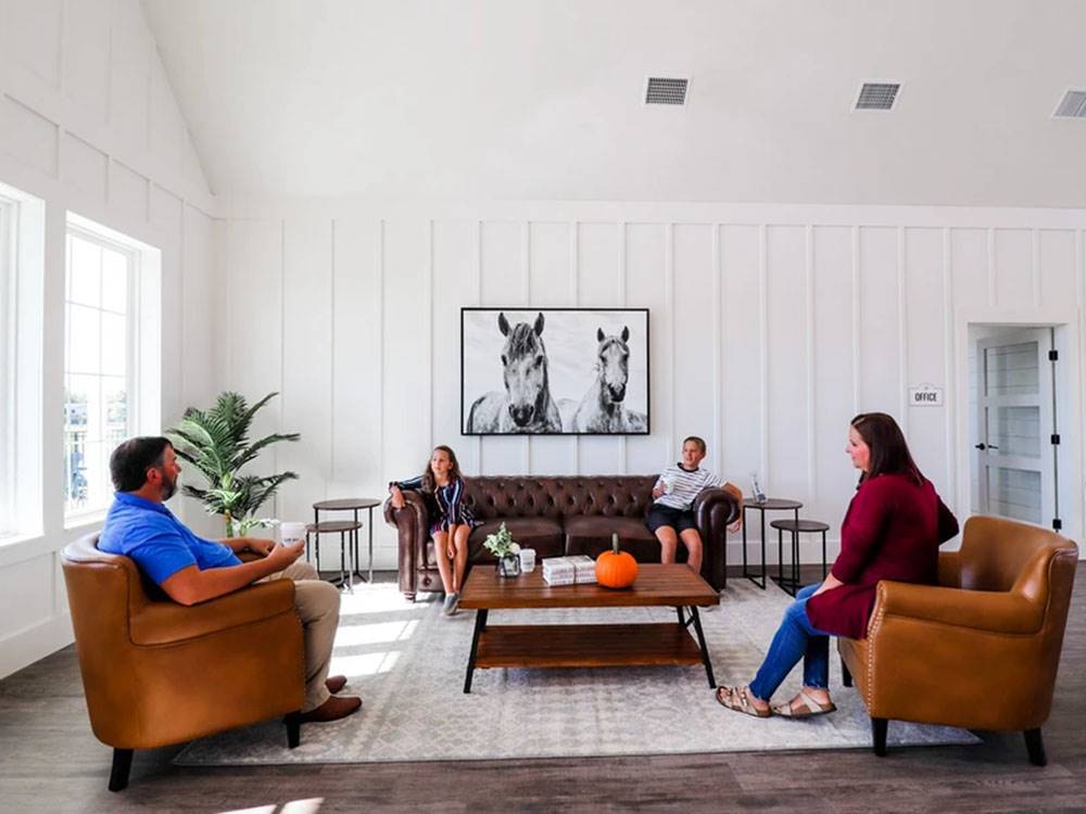 People sitting on sofas in the farmhouse