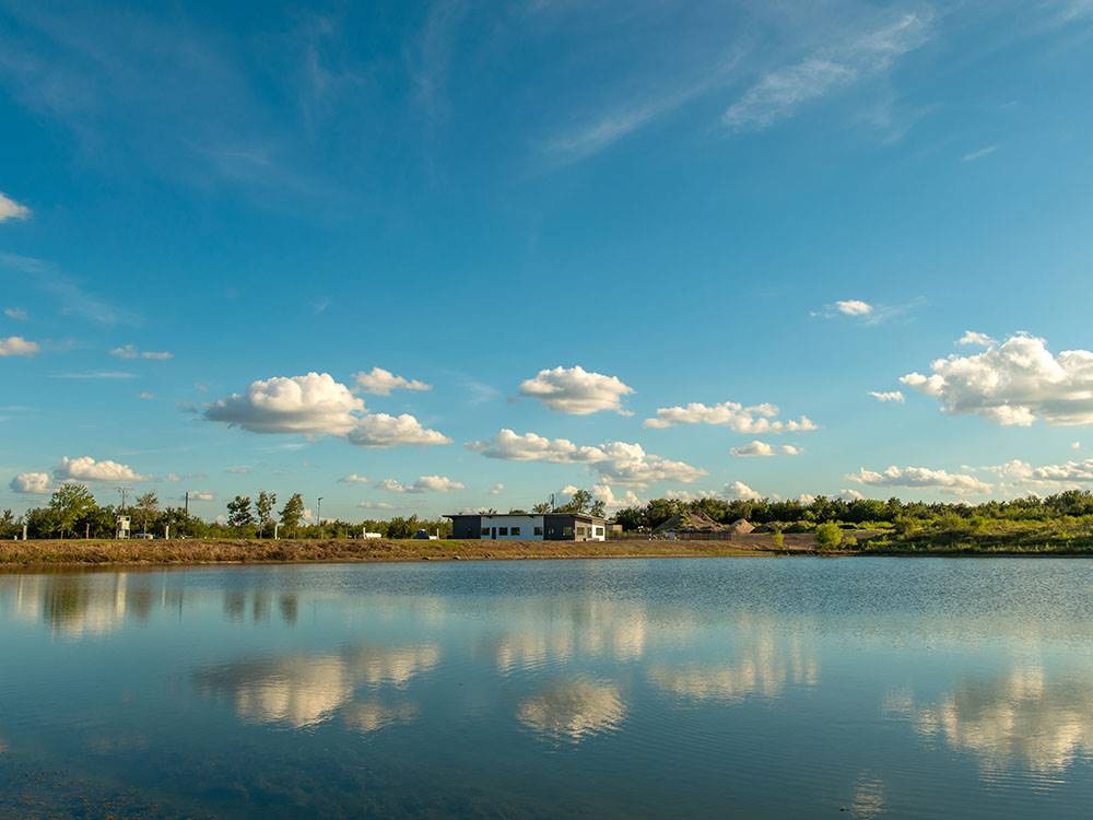 Clouds reflect on the water