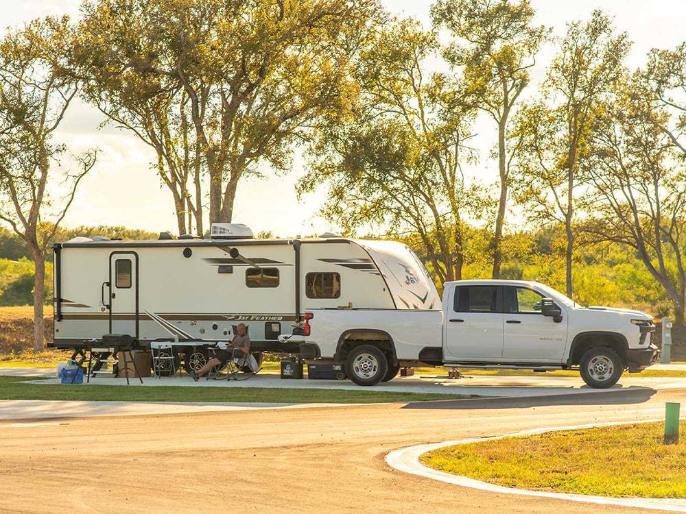 A travel trailer and truck