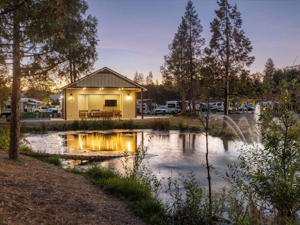 A building and pond at night