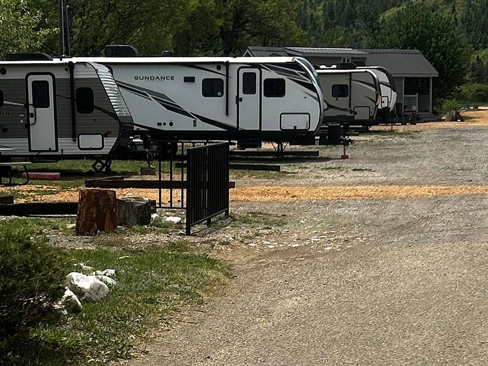 Row of travel trailers at sites