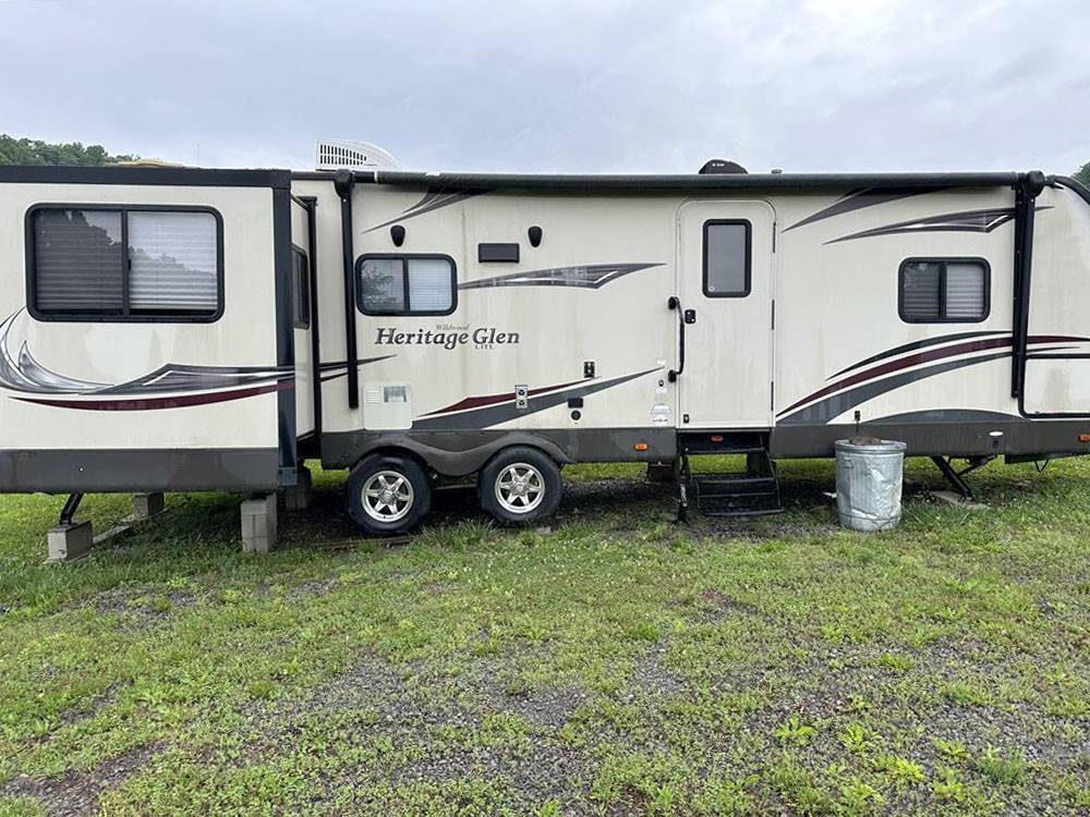 A travel trailer at a site