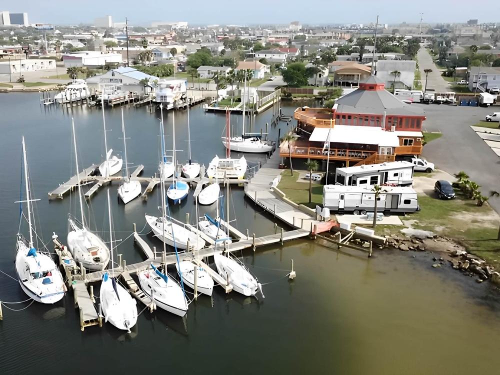 Boats docked at site Galveston RV Resort & Marina
