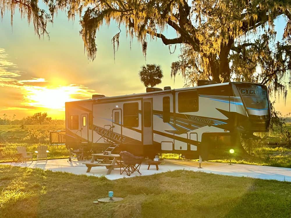 A gravel trailer on a paved site