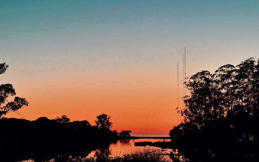 RV parked near open site at Beach RV Pleasure Point