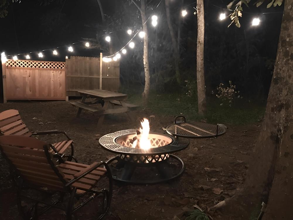 Firepit surrounded by chairs