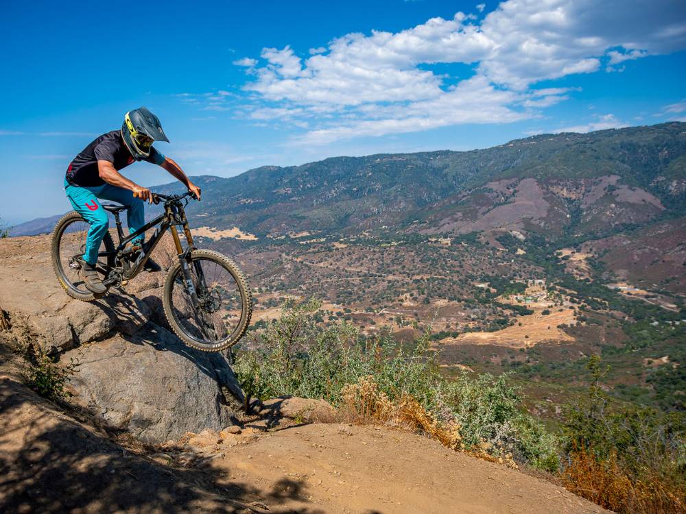 A person mountain biking