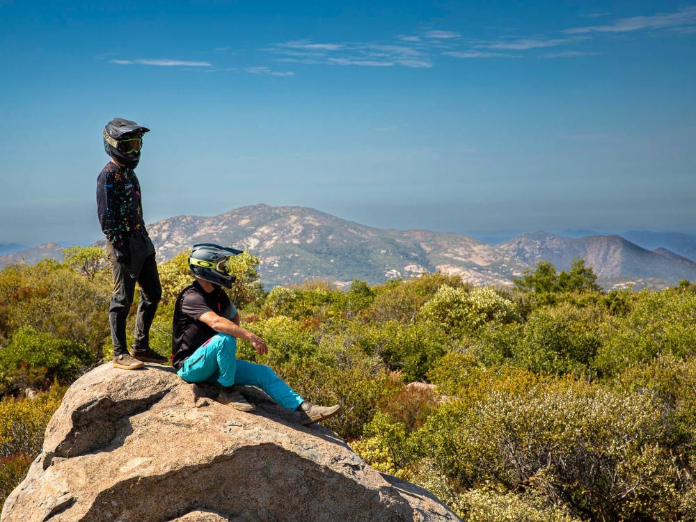 Mountain bikers on a rock