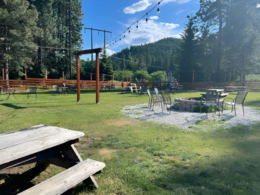 Table and chairs around firepit