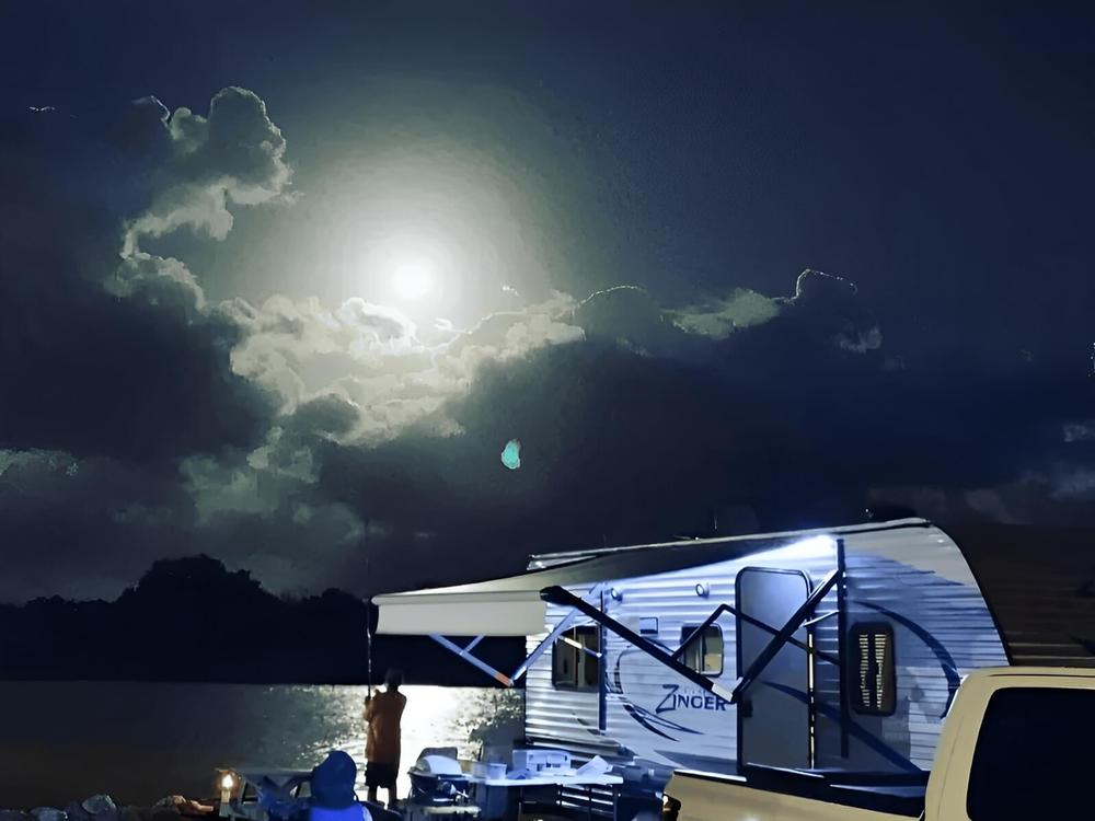 RV near the water at night at Indian Mound Fish Camp