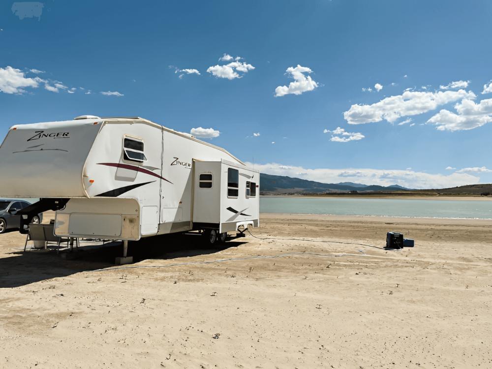 Parked trailer at site Sandy Beach at Yuba Lake