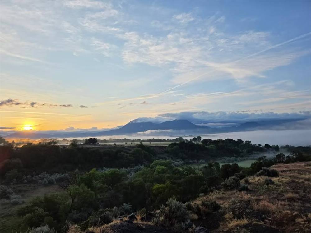 Sunrise by the mountain