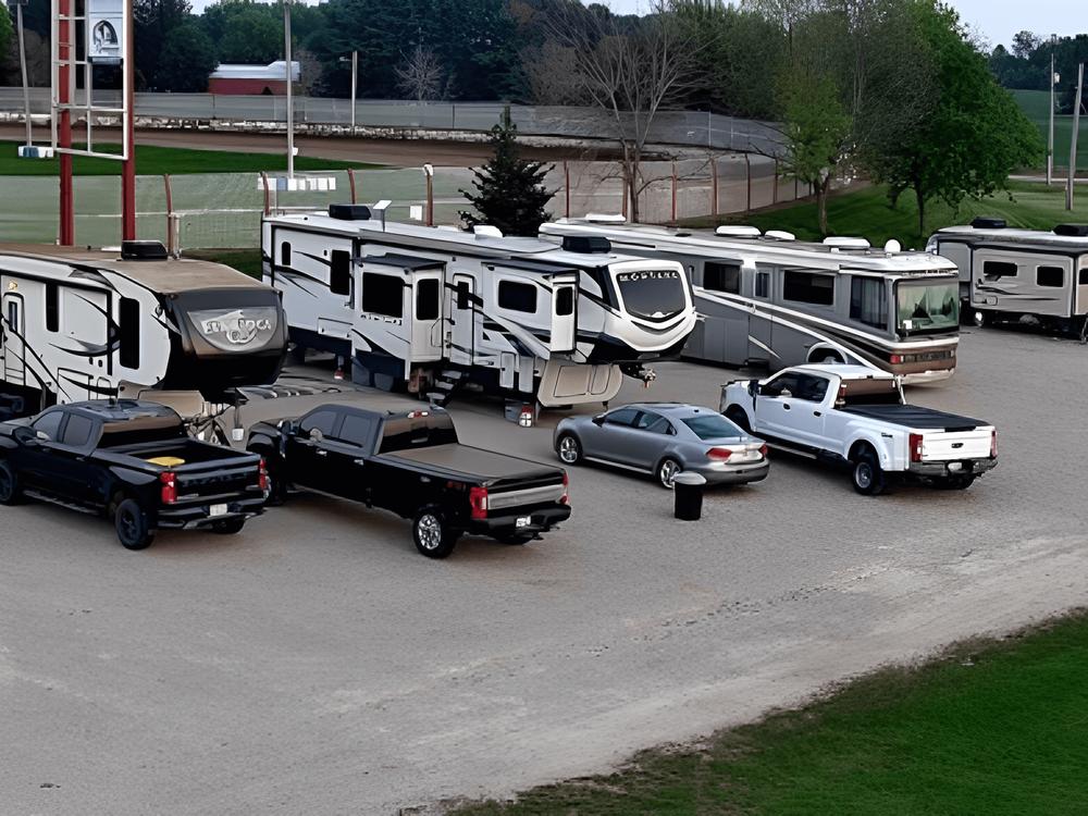 RVs and autos parked at Fairgrounds RV Park - WI