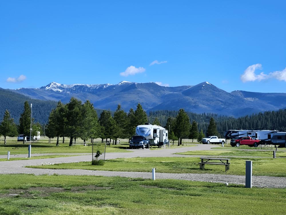 RV site with view of Mountains at Lost Moose Meadows Campground & RV Park