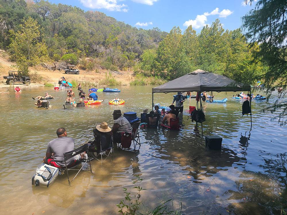People cooling off in the river