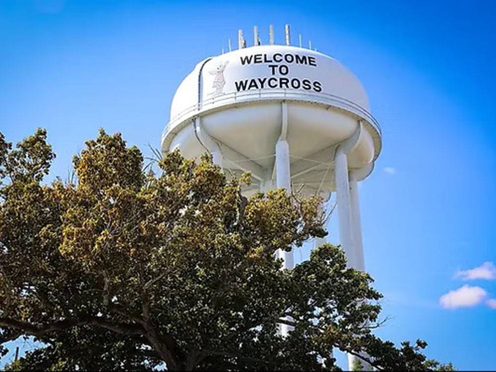 A water tower with Welcome to Waycross on it