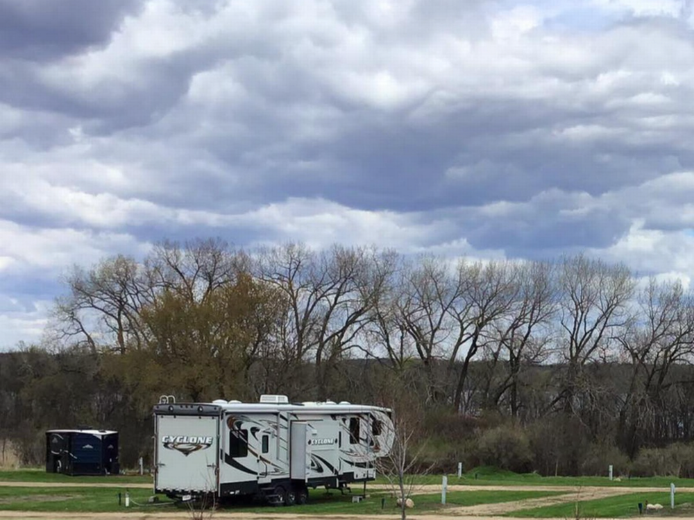 A travel trailer parked at site at Camping 109