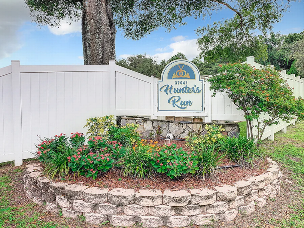 The sign at the entrance of the park at Hunters Run RV Estates