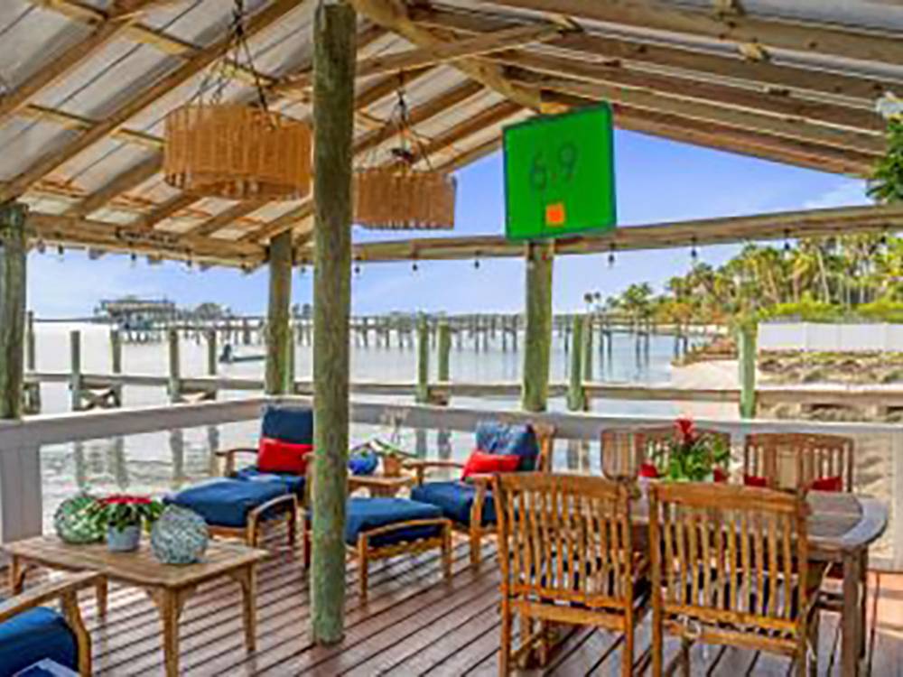 Lounge chairs and tables by the river