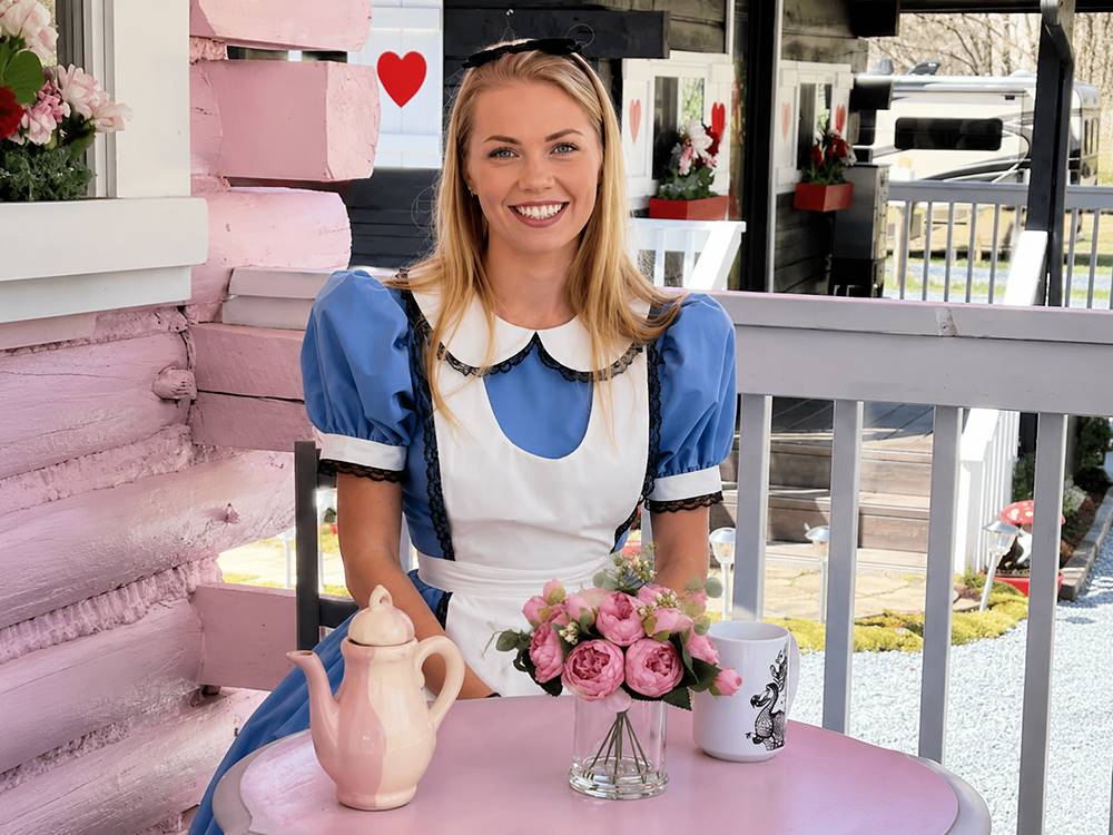 A woman dressed as Alice