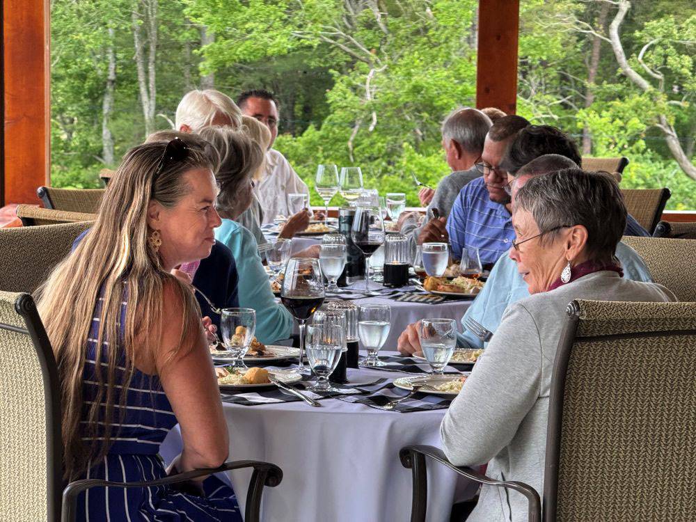 Groups of people eating outside