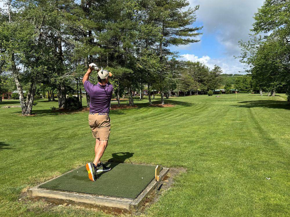 A man golfing