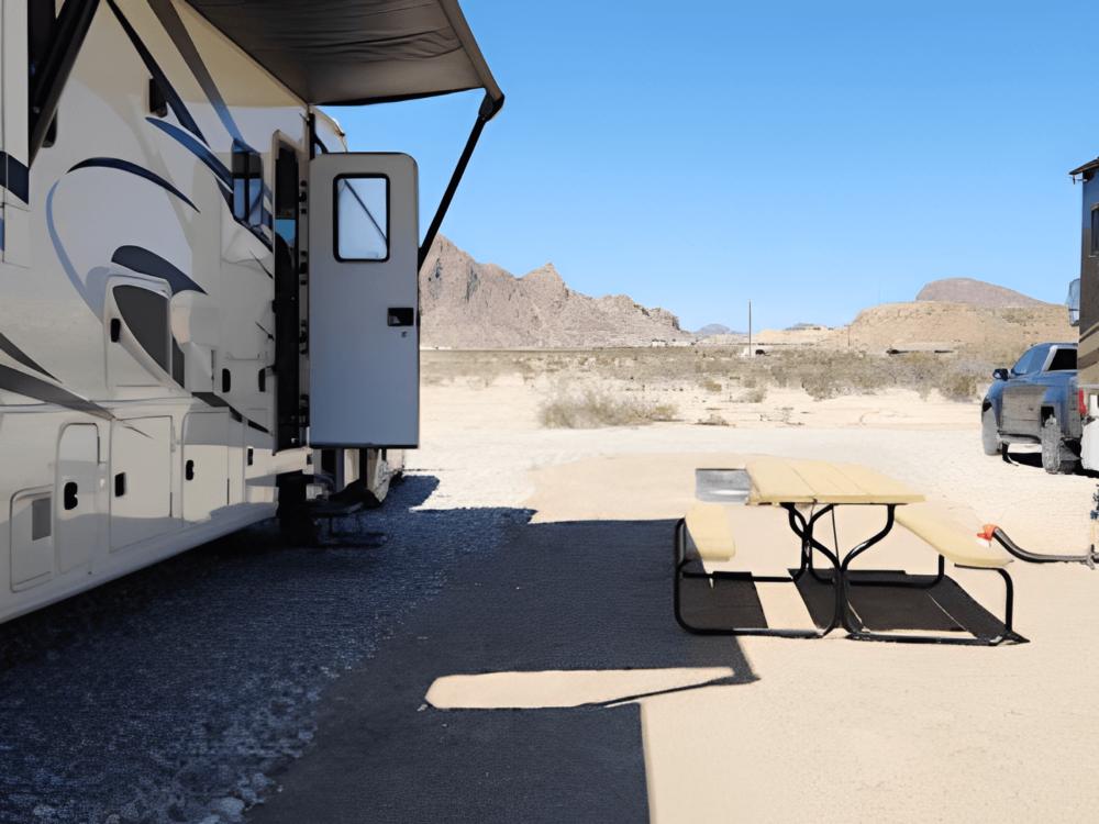 Parked RV with panic table at Around the Bend RV Park